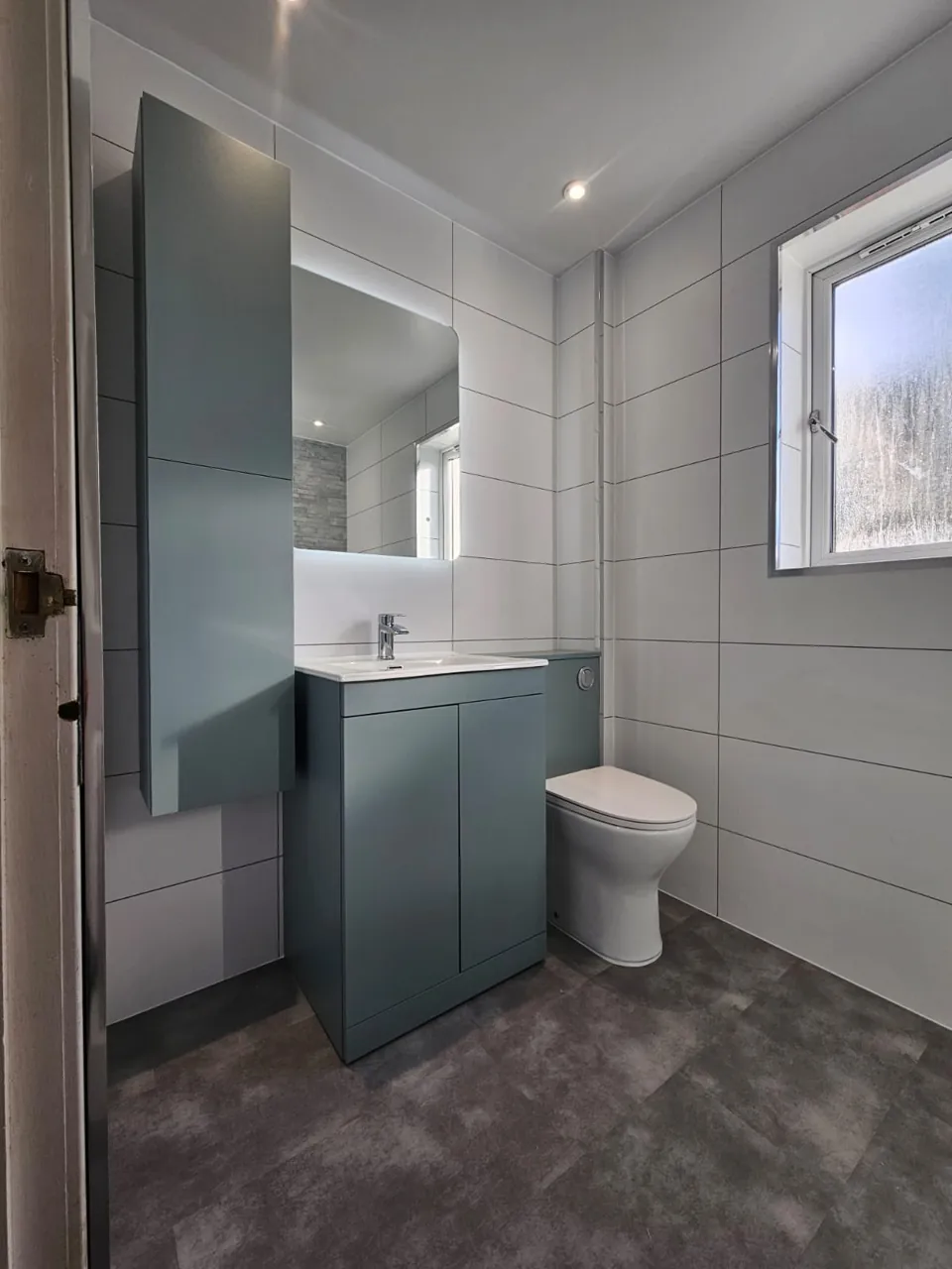 Blue-grey vanity, basin and matching toilet unit